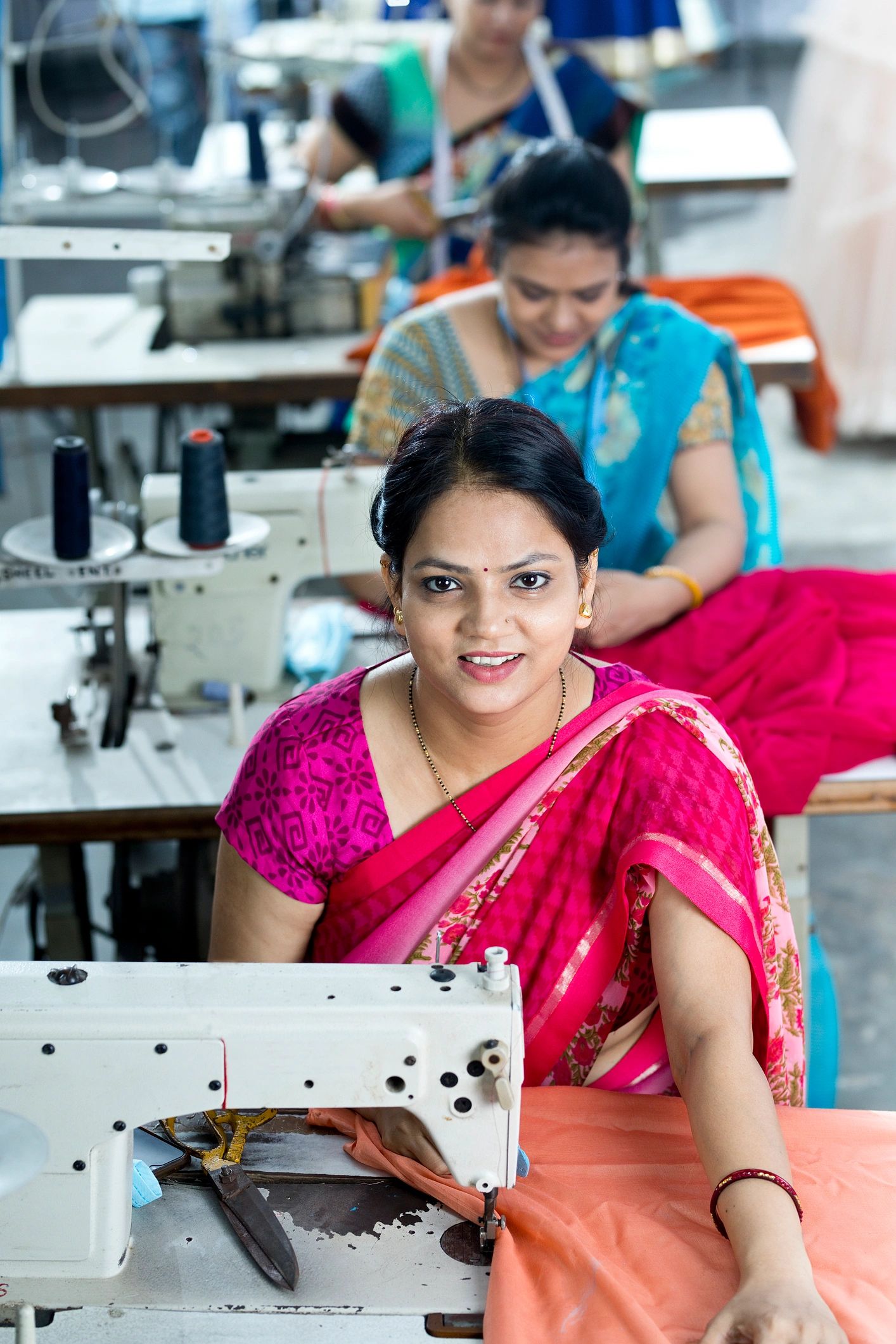 Indian women textile workers on a production line