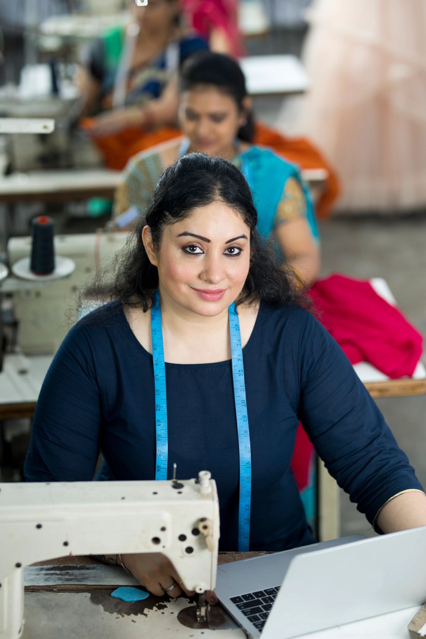 Sampling team member working in a textile factory