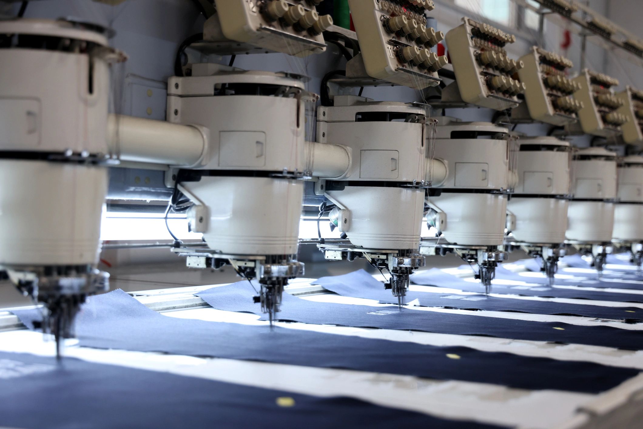 Automated textile machine in a manufacturing setting
