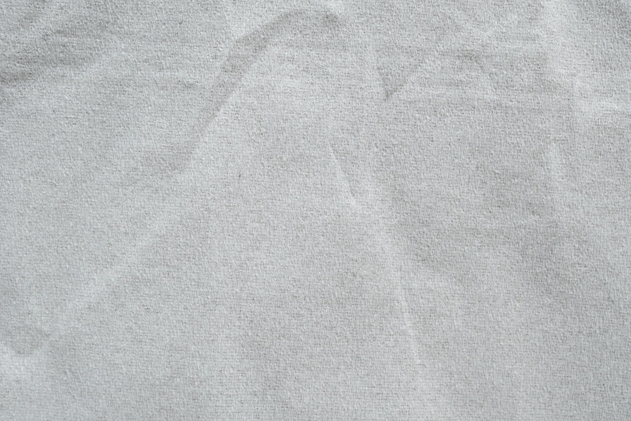 Light gray textured fabric background